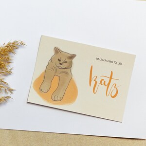 Design-Postkarte Katze mit Spruch "Ist doch alles für die Katz"