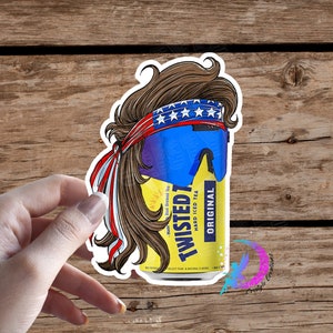 May include: A sticker of a can of Twisted Tea hard iced tea with a mullet and a bandana with stars and stripes. The can is yellow with black text and a blue and white design.