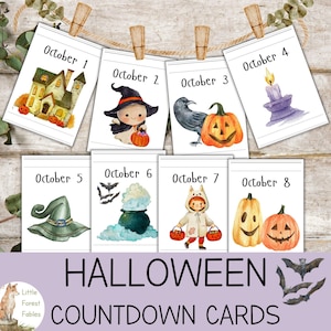 May include: Halloween countdown cards featuring watercolor illustrations of pumpkins, a witch, a crow, and a haunted house. The cards are clipped to a string with wooden clothespins. The text "Halloween Countdown Cards" is displayed below the cards.