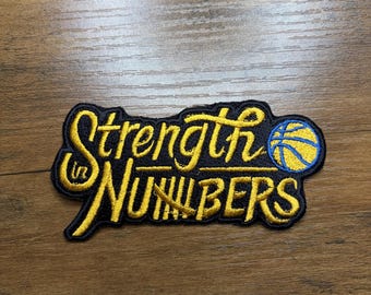 Parche bordado termoadhesivo de 2 x 4 pulgadas con el lema "La fuerza está en los números" de los Golden State Warriors.