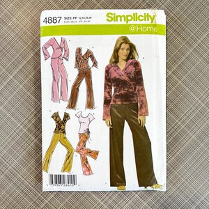 May include: Simplicity at Home sewing pattern number 4887 for sizes PP 12, 14, 16, 18. EUR 38-44, FR 40-46. The pattern includes instructions for making a top and pants.