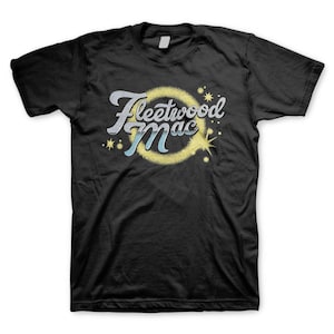 May include: A black short-sleeve t-shirt featuring the text Fleetwood Mac in a stylized silver and blue font. The text is encircled by a textured yellow ring with small yellow star accents surrounding the graphic on the front of the shirt.