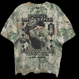 May include: A short-sleeve t-shirt with a green and brown camouflage leaf pattern. The front features a graphic of Post Malone, the text "POST MALONE", "F-1000000000000", and "a selection of country songs by Posty and friends" with star accents.