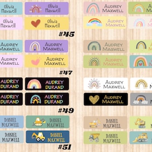 May include: Set of colorful personalized name labels with rainbow, sun, heart, and construction vehicle designs. The labels are numbered #245, #246, #247, #248, #249, #250, #251, and #252.