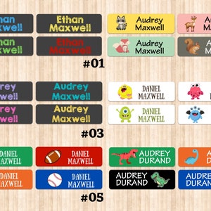 May include: Six sets of colorful personalized name labels with various designs. The designs include animals, monsters, sports equipment, and dinosaurs. The labels are rectangular and have a white background with black text. The text includes names like Ethan Maxwell, Audrey Maxwell, Daniel Maxwell, and Audrey Durand.