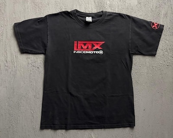 May include: A black short-sleeved t-shirt featuring a red and white graphic on the chest that reads IMX INSIDEMOTOX. The shirt also displays a small red circular logo with an X on the left sleeve. The garment has a crew neckline and a standard fit.
