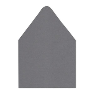 May include: A gray envelope with a triangular flap. The envelope is a solid, muted gray color and is set against a white background. The envelope's shape is a classic design for stationery and invitations.