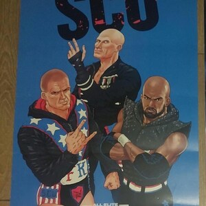 May include: A blue poster featuring the text SCU at the top and three bald wrestlers in the center. The wrestlers wear black athletic gear with red, white, and blue star accents. The bottom includes the logos for DC, All Elite Wrestling, and TNT.
