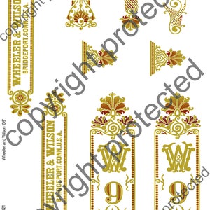 May include: A sheet of vintage sewing machine decals featuring ornate gold and burgundy designs. The decals include the text "WHEELER & WILSON BRIDGEPORT.CONN.U.S.A." and the number "9".