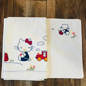 Hello kitty cheap crib sheet