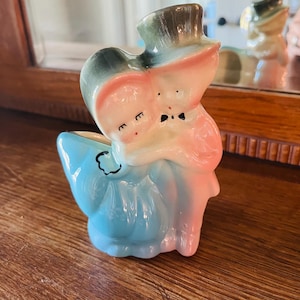 Shawnee Pottery Boy and Girl Vase Planter