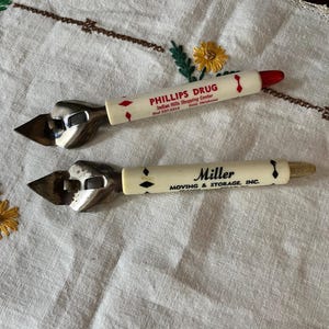 Pair of Vintage Bottle Openers with Advertising Logos