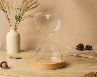 Botella de reloj de arena redonda recargable con grabado personalizado con base de madera | Reloj de arena vacío personalizado para boda, urna de regalo para decoración del hogar con temporizador de arena