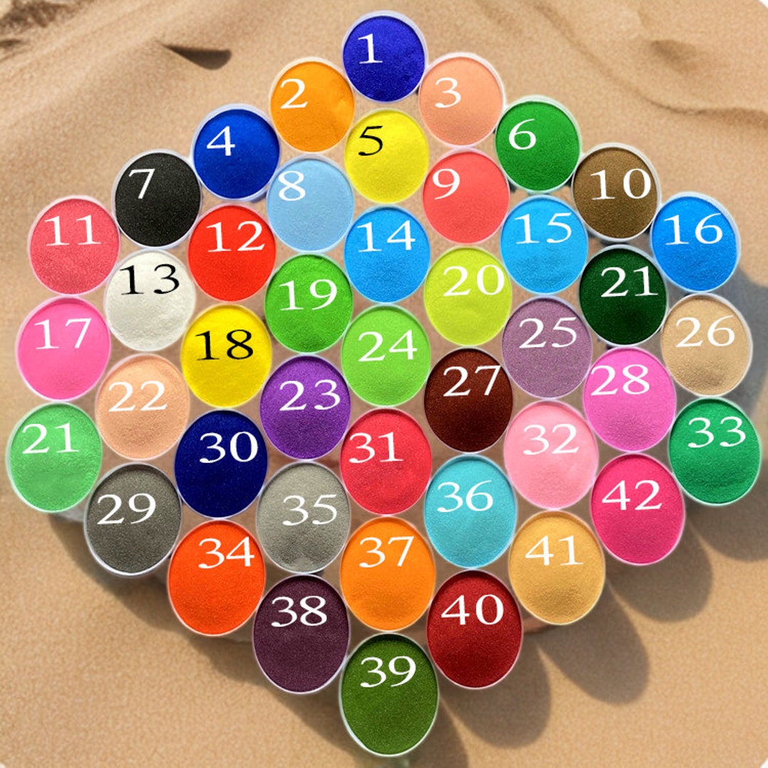 Art du sable, décoration de mariage sur la plage, sable coloré, sable ...