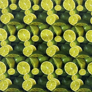 May include: A seamless pattern of green limes and lime slices. The limes are arranged in a repeating pattern, with some limes whole and some sliced in half. The background is a dark green.