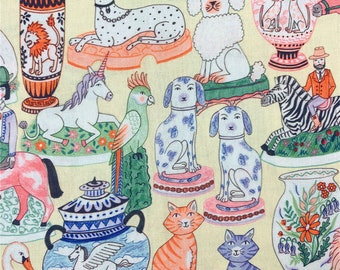 May include: A yellow fabric featuring a colourful pattern of animals and vases. The design includes a unicorn, a parrot, a zebra, a cat, a dog, and a swan. The vases are decorated with floral and geometric designs.