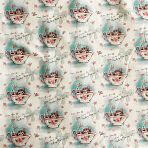 May include: A repeating pattern of kittens in teacups on a light beige background. The kittens are white with black stripes and are sitting in blue and white teacups with pink flowers. The background is covered in small pink flowers and white bows. The text "Hope you'll soon be feeling pure  fect!" is repeated throughout the pattern.