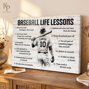May include: A baseball-themed canvas print with the text "BASEBALL LIFE LESSONS" and a baseball player illustration. The print features inspirational quotes and a distressed wood-like background. The player's jersey displays the name "CARTER" and the number "10".