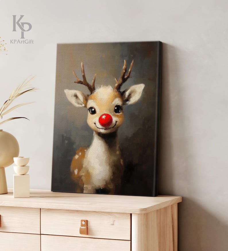 May include: A painting of a reindeer with a red nose. The reindeer is looking at the viewer and has a friendly expression. The background is a dark brown color.