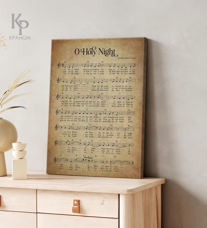 May include: Vintage style print of the song "O Holy Night" with sheet music and lyrics. The print is on a beige background with brown text.