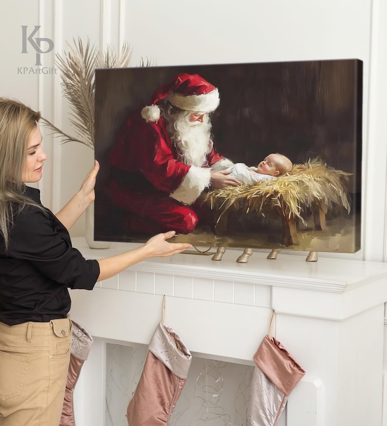 May include: A painting of Santa Claus in a red suit with a white beard, kneeling beside a baby in a manger. The baby is wearing a white robe and has a halo above its head. The painting is set against a dark background with a straw-filled manger.