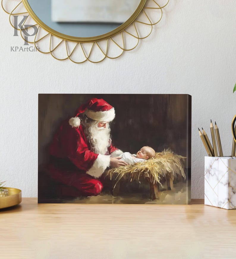 May include: A painting of Santa Claus kneeling beside a baby Jesus in a manger. Santa is wearing a red suit with white trim and a white beard. The baby is lying on a bed of straw and is wearing a white robe.