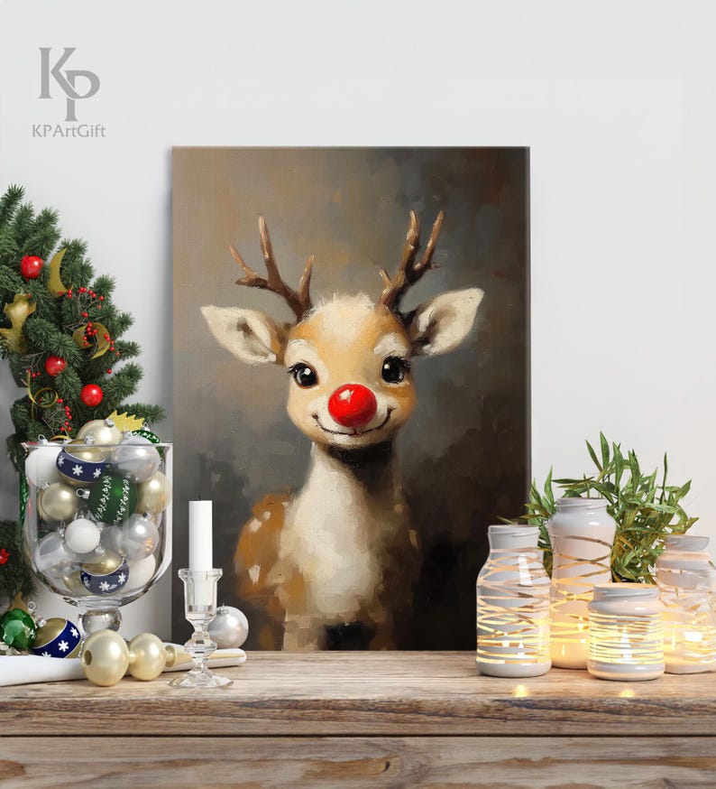 May include: A painting of a cartoon reindeer with a red nose. The reindeer is looking directly at the viewer and has a friendly expression. The painting is on a canvas and has a brown wooden frame.