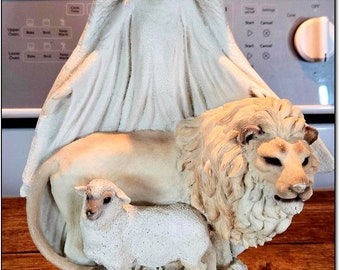 Vintage 1991 “Winterlight”, an Angel, Lion and Lamb Statue by United Design Corp. 10x12” 75 Dollars. OPDC-D011