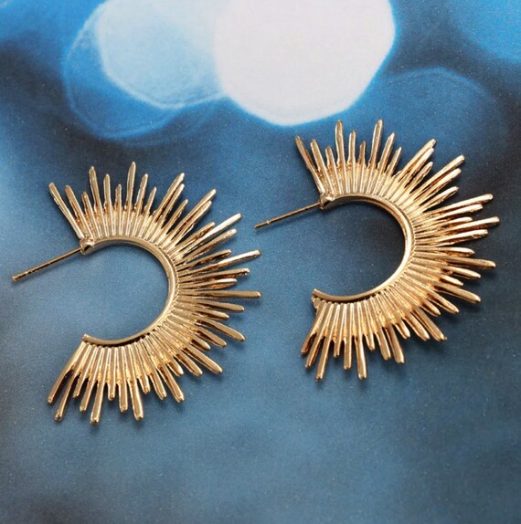 Half sun best sale earrings
