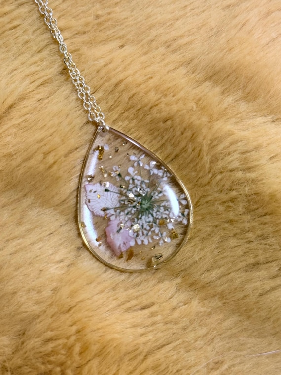 Real flowers in resin pendant
