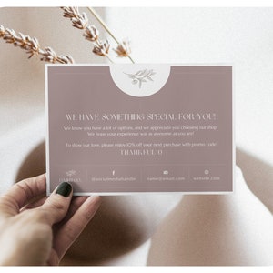 May include: A mauve-colored card with the text "WE HAVE SOMETHING SPECIAL FOR YOU!" and a floral design. The card includes a thank you message and a discount code. The card also displays social media handles and a website address.