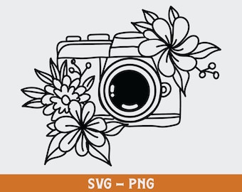 May include: Black and white line art illustration of a camera with flowers. The camera has a lens and a body with a strap. The flowers are stylized and have petals and leaves.