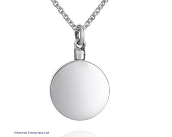 May include: A silver chain necklace with a round, smooth pendant. The pendant is blank and can be engraved.