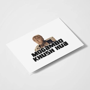 May include: A white card with a photo of an actor in a costume. The text "Mogambo Khush Hua" is printed in black on the card.