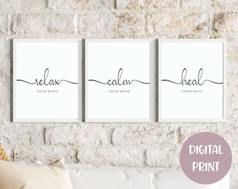 May include: Three white framed prints with black text on a white background. The prints read "relax your body", "calm your mind", and "heal your soul".