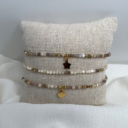 TRIO of AGATA high quality bracelets in 2mm pearls on elastic, gold plated. Unique pieces .