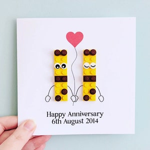 Biglietto personalizzato con giraffa Happy Anniversary di mattoni