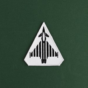 May include: White triangle patch with a black embroidered image of a fighter jet.