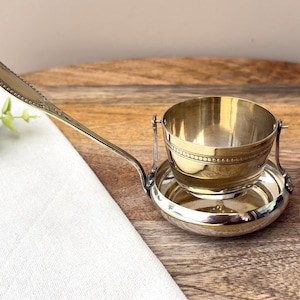 Colador de té antiguo victoriano de plata con cardán y tazón basculante.