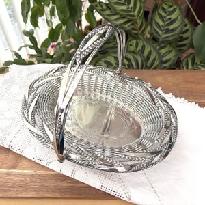 May include: A set of three ceramic mugs with a speckled, matte finish. The mugs are in shades of cream, light gray, and dark gray. Each mug has a simple, minimalist design, perfect for coffee or tea.