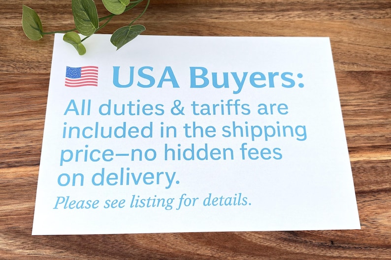 May include: A white rectangular sign featuring a small American flag icon and light blue text that reads: USA Buyers: All duties & tariffs are included in the shipping price&mdash;no hidden fees on delivery. Please see listing for details.