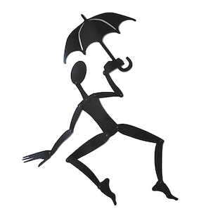 May include: A black metal silhouette of a person holding an umbrella, with articulated limbs, in a jumping pose.