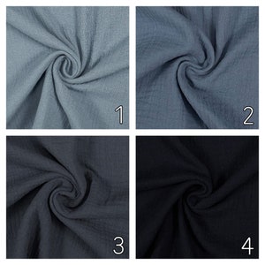 May include: Four fabric swatches in different shades of blue. The swatches are arranged in a grid with numbers 1 through 4 in the bottom right corner of each swatch.