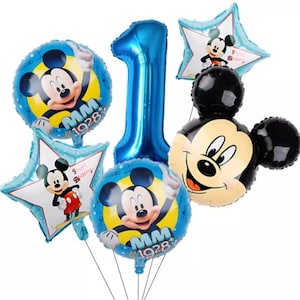 May include: A set of Mickey Mouse-themed balloons in blue and yellow, with a large number one balloon. The balloons feature Mickey Mouse and the text "MM 1928" and "Happy Birthday". Perfect for a first birthday celebration.