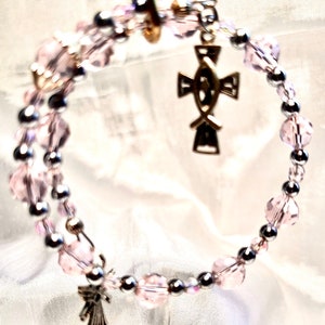 SWAROVSKI CRYSTAL & MAGNET Rosary Bracelet… never looses its shape, is easy to put on and comfortably adjusts to every wrist.