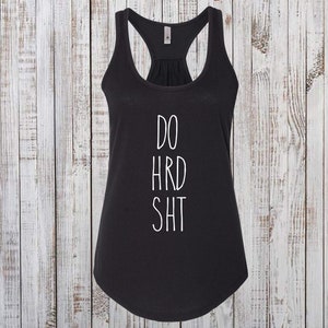 May include: Black racerback tank top with the text "DO HRD SHT" in white.
