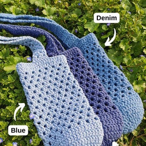 May include: Three crocheted bags in different shades of blue, labeled "Blue", "Dark Blue", and "Denim".