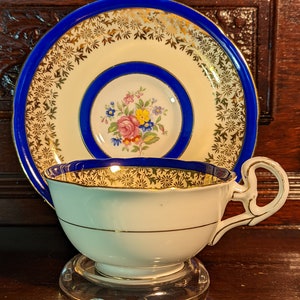 Xícara de chá e pires Royal Grafton, azul cobalto com detalhes dourados e padrão floral