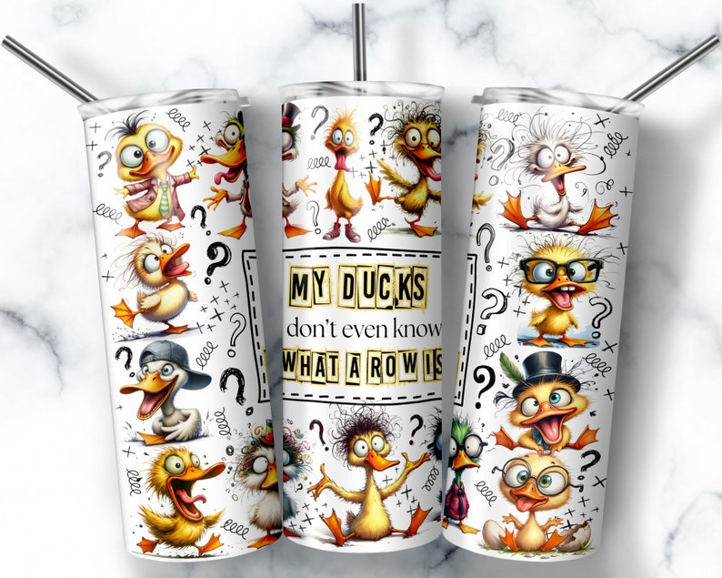 May include: A white cylindrical tumbler with a metal straw featuring a repeating pattern of cartoon ducks with various expressions and accessories, interspersed with question marks and scribbles, and the text MY DUCKS don't even know WHAT A ROW IS.