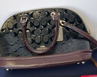 Coach Vintage Patent Leather Satchel: Embossed Monogram, Brown Leather Base